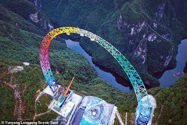 As part of the Yunyang Longgang Scenic Spot, the gigantic swing (pictured) consists of a 328-foot-tall arch and a 354-foot-tall launching tower and is situated at an altitude of 3,608 feet